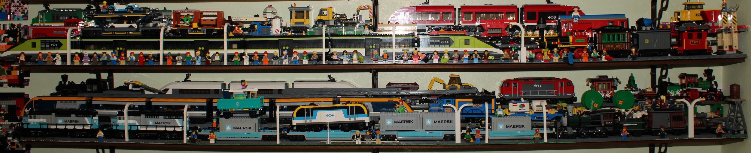 Lego - Creator, 10219 Maersk train, unboxed; City, 60337 Express Passenger Train, unboxed; 7938 Passenger Train, unboxed; 79111 The Lone Ranger, Constitution Train Chase, unboxed; a quantity of Minifigures; etc (qty)  (10219) Retired product. Previously £91.99RRP.  (60337) £139.99RRP.  (7938) Retired product. Previously £102.99RRP.  (79111) Retired product. Previously £79.99RRP.  This lot is part of a collection from a deceased estate. All models were constructed and remained constructed in the home and as such we do not have boxes or instruction manuals and the models are therefore sold as seen.