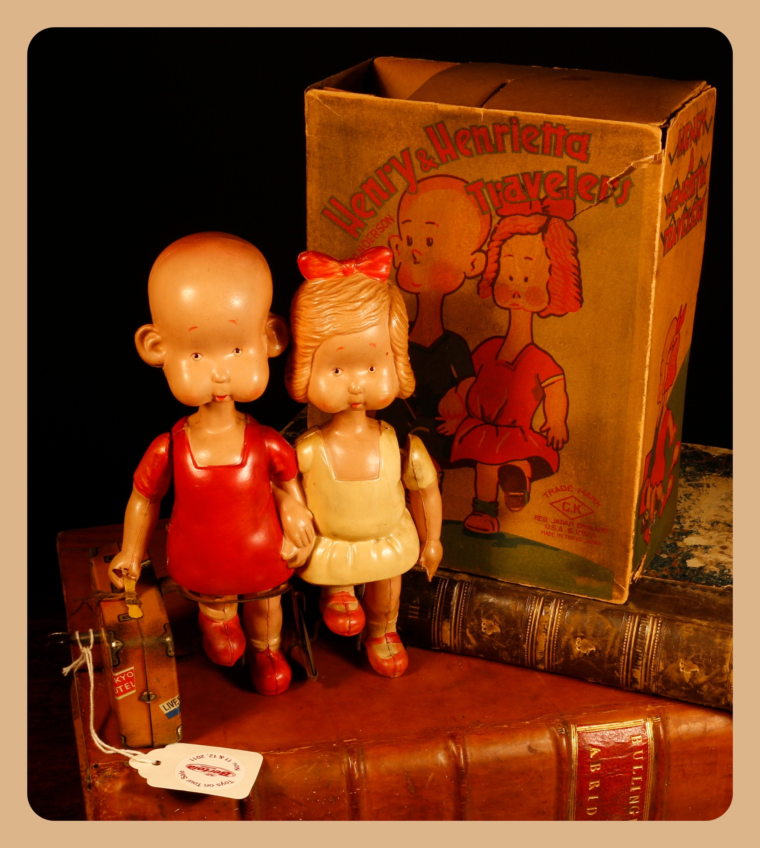 Henry, From Cartoon to Comic Strip, Lots 7000 - 7024, from a deceased single-owner collector from a Derbyshire Estate  Americana & Comic Strip Interest (Carl Anderson) – a rare 1930’s C.K. (Kuramochi, Japan) tinplate and celluloid fixed keywind novelty Henry & Henrietta Travelers toy, 18cm high, boxed  Provenance – original auction label from Bertoia Auctions Toys on Tour Sale, Lot 718, November 11th & 12th, 2011