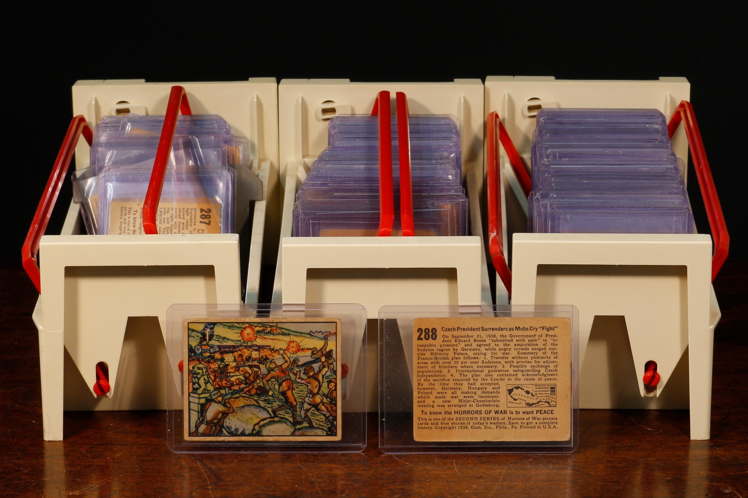 Trade Cards - a complete set of Gum Inc. 1938 Horrors of War cards, each 2½" by 3⅛", comprising cards numbered 1-288, each ungraded, displayed in a rounded rectangular sleeve/wallets