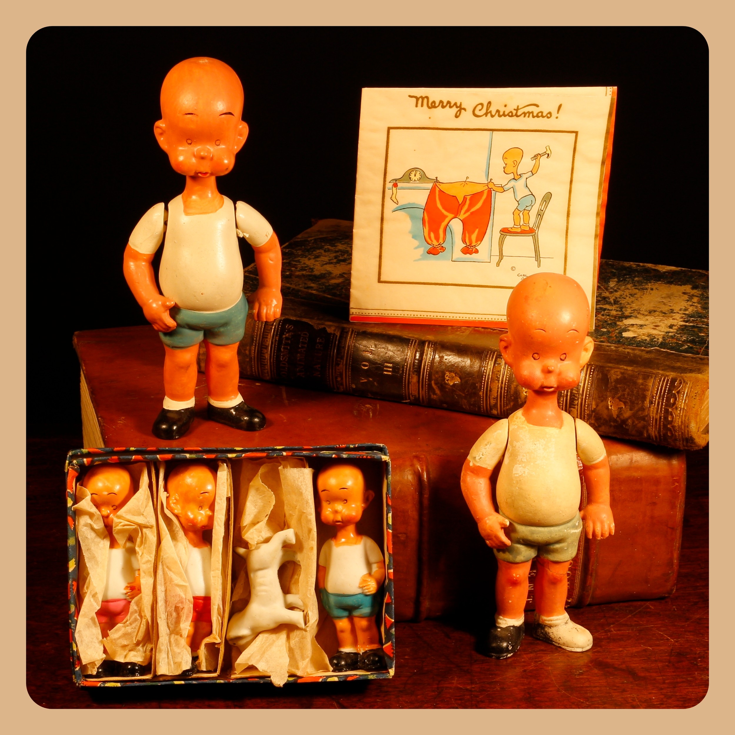 Henry, From Cartoon to Comic Strip, Lots 7000 - 7024, from a deceased single-owner collector from a Derbyshire Estate  Americana & Comic Strip Interest (Carl Anderson) – a Japanese painted 'chalkware' type novelty figure of Henry, jointed arms, 17cm high; another, similar; a set of four Japanese unglazed 'bisque' novelty Henry figures, each with painted detail, boxed and a 1930's pictorial Christmas card