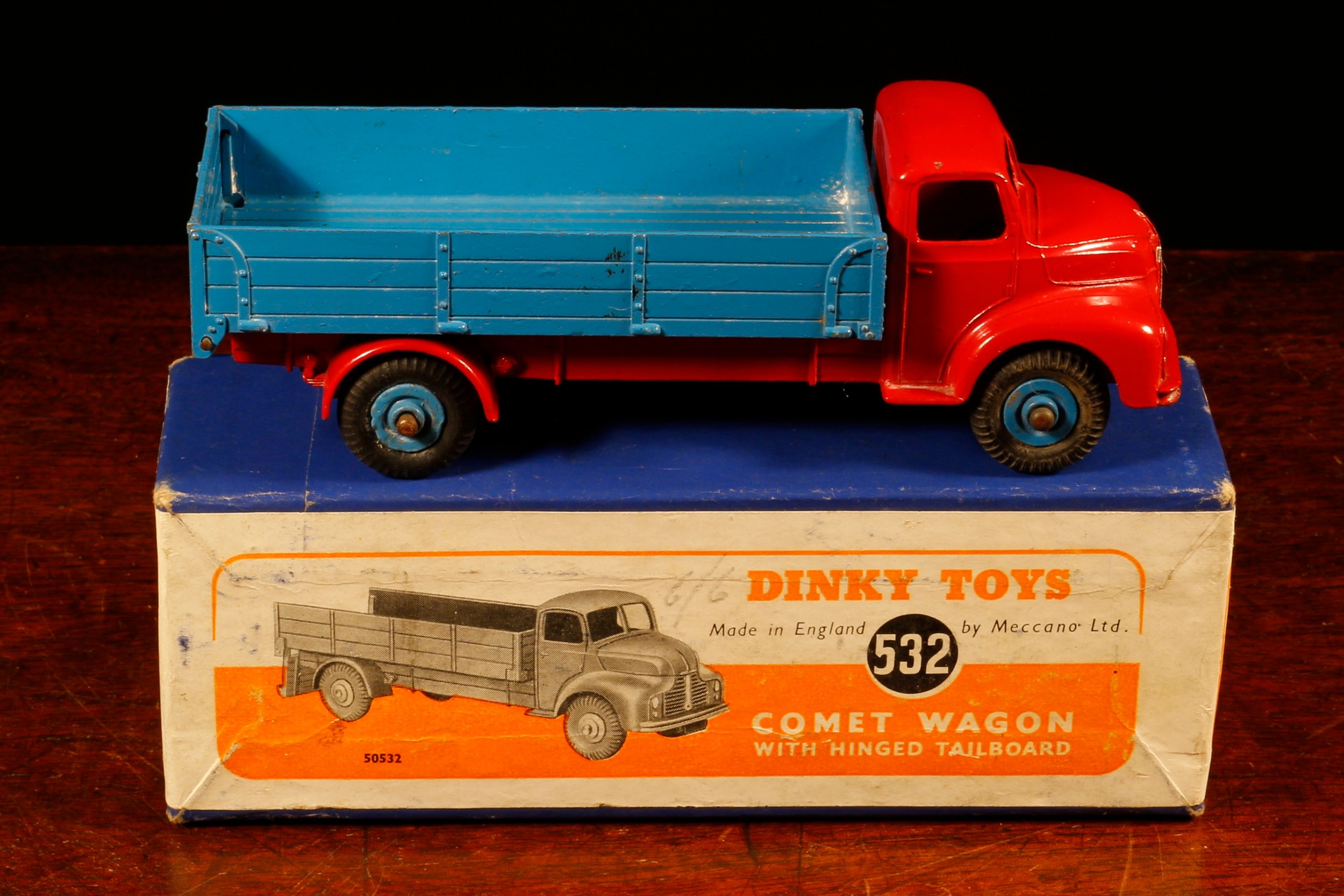 A rare Dinky Toys 532 Comet wagon (unusual colour variation), red cab and chassis, blue wagon with hinged tailboard, blue hubs, boxed