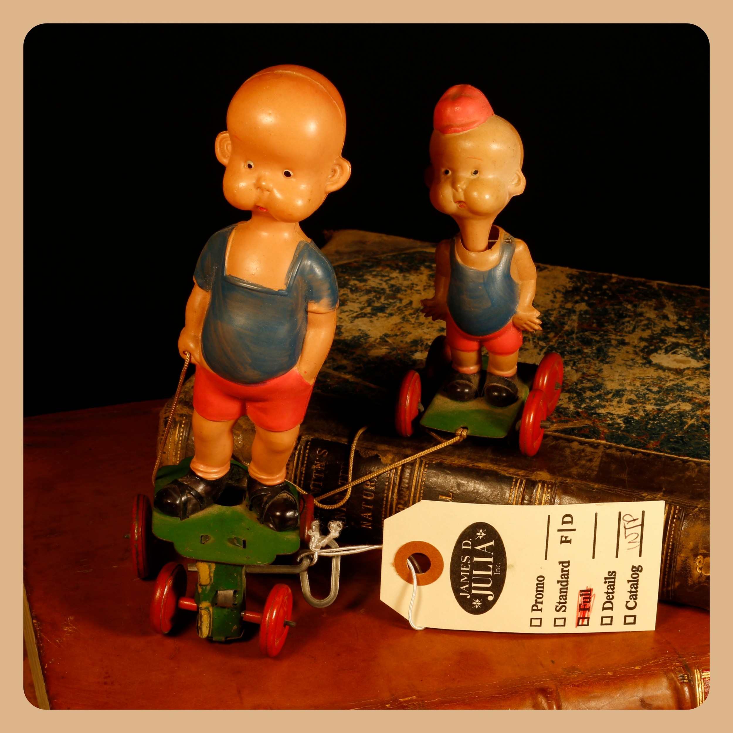 Henry, From Cartoon to Comic Strip, Lots 7000 - 7024, from a deceased single-owner collector from a Derbyshire Estate  Americana & Comic Strip Interest (Carl Anderson) – a Japanese tinplate and celluloid fixed keywind novelty Henry and His Little Brother toy, 17cm high, unboxed  Provenance – original auction label from James D.Julia Inc., Lot 3423