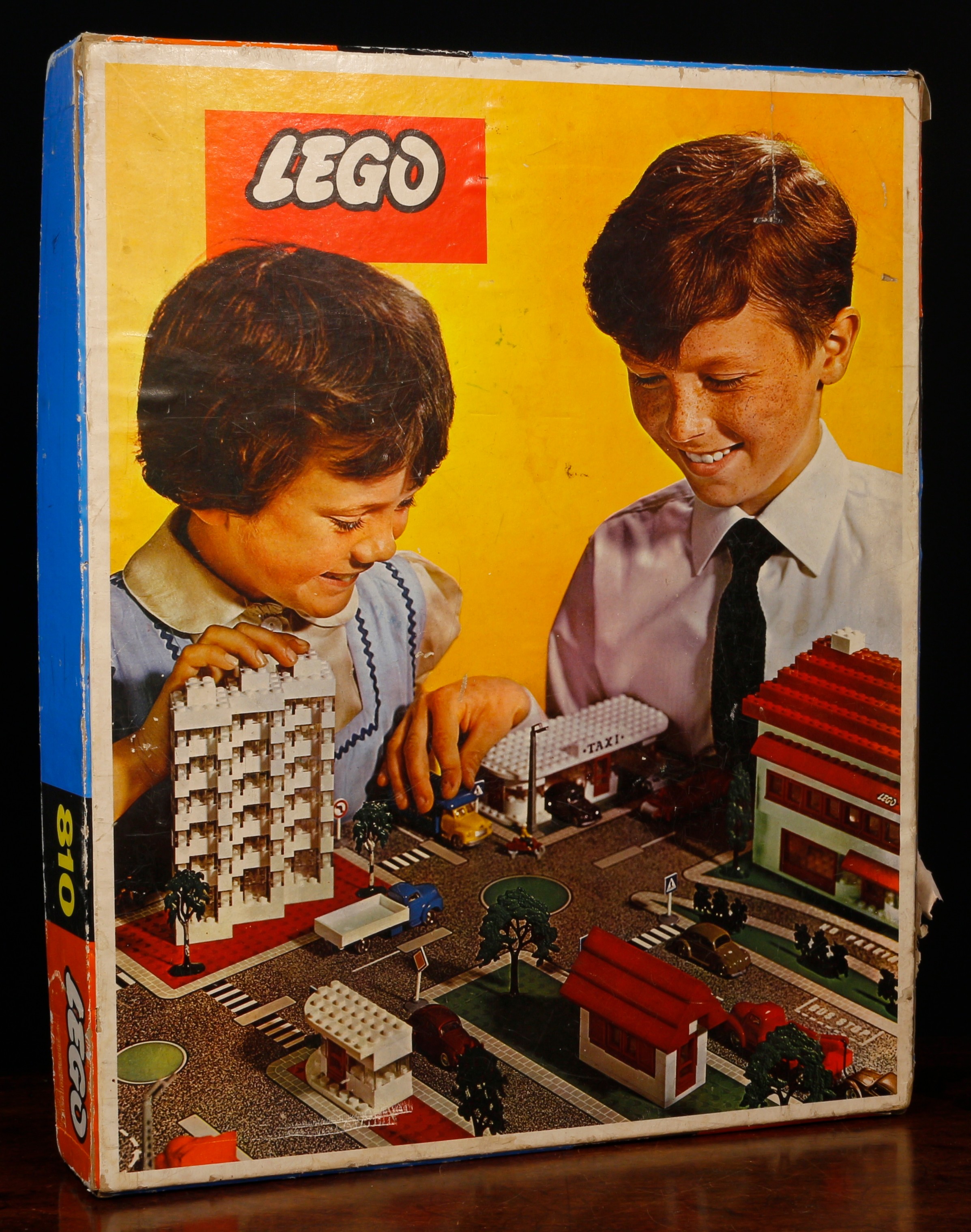 A Lego 810 Town Plan construction set, comprising various size and different colour bricks and accessories, boxed with fold-out base board and literature