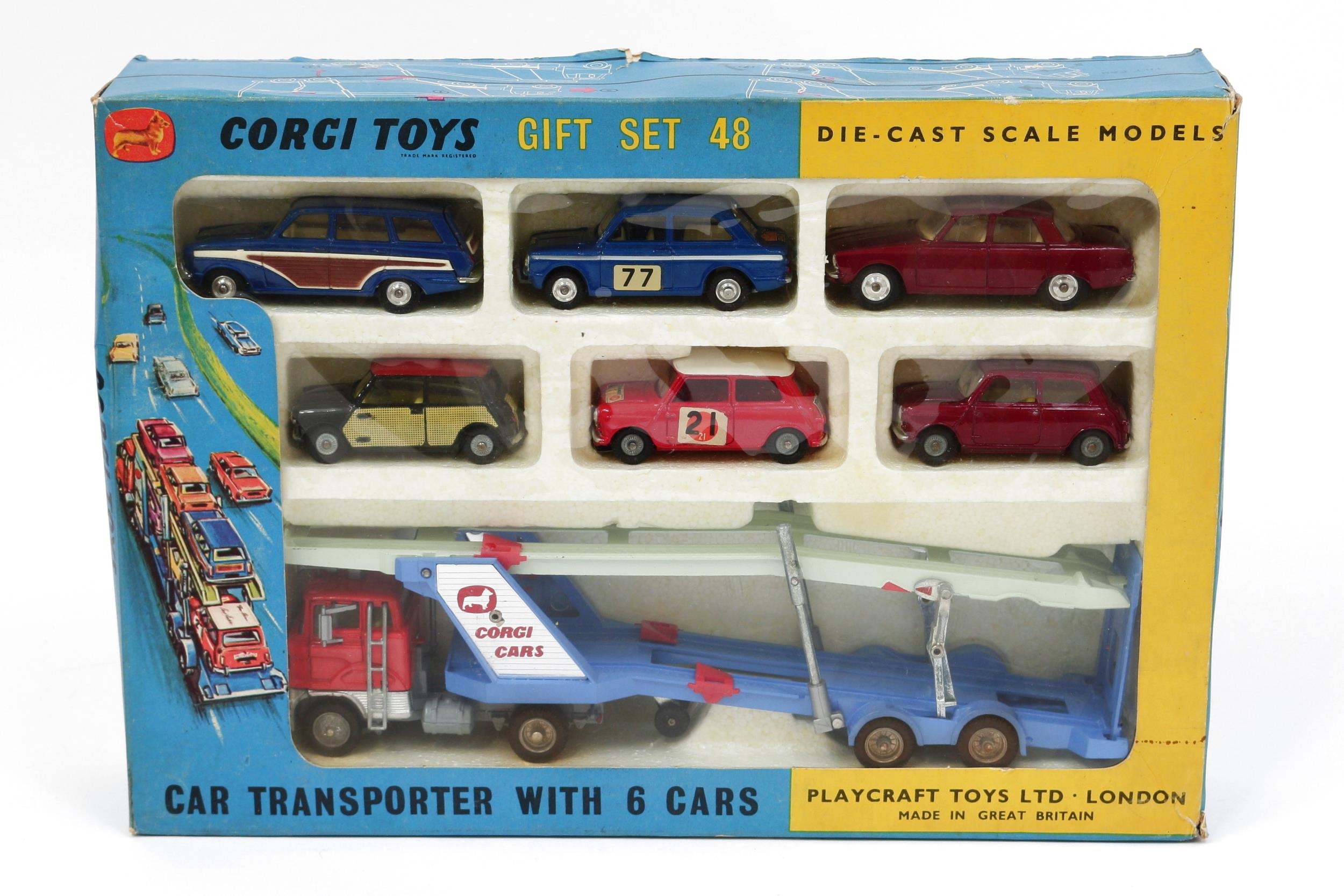 Corgi Toys Gift Set 48, comprising 1138 Carrimore car transporter with Ford tilt cab, orange cab with two tone blue transporter; 252 Rover 2000, metallic maroon body with cream interior, spun hubs; 340 Sunbeam Imp, metallic blue body with 'RALLYE MONTE CARLO' decals and racing number '77' to side doors, cream interior, spun hubs; 440 Ford Consul Cortina super estate car, metallic blue body with faux side panels, cream interior, spun hubs; 249 Morris Mini Cooper DeLuxe, black body with faux 'wickerwork' side panels and red roof, lemon yellow interior; 333 Austin Mini Cooper 'S', red body with white roof, 'RAC/SUN INTERNATIONAL RALLY' decals and racing number '21' to side doors, red interior; 226 Morris Mini-Minor, maroon red body, lemon yellow interior, window boxed with inner polystyrene display piece, 'JOIN THE CORGI MODEL CLUB' original literature slip and fifteen red/yellow plastic traffic cones