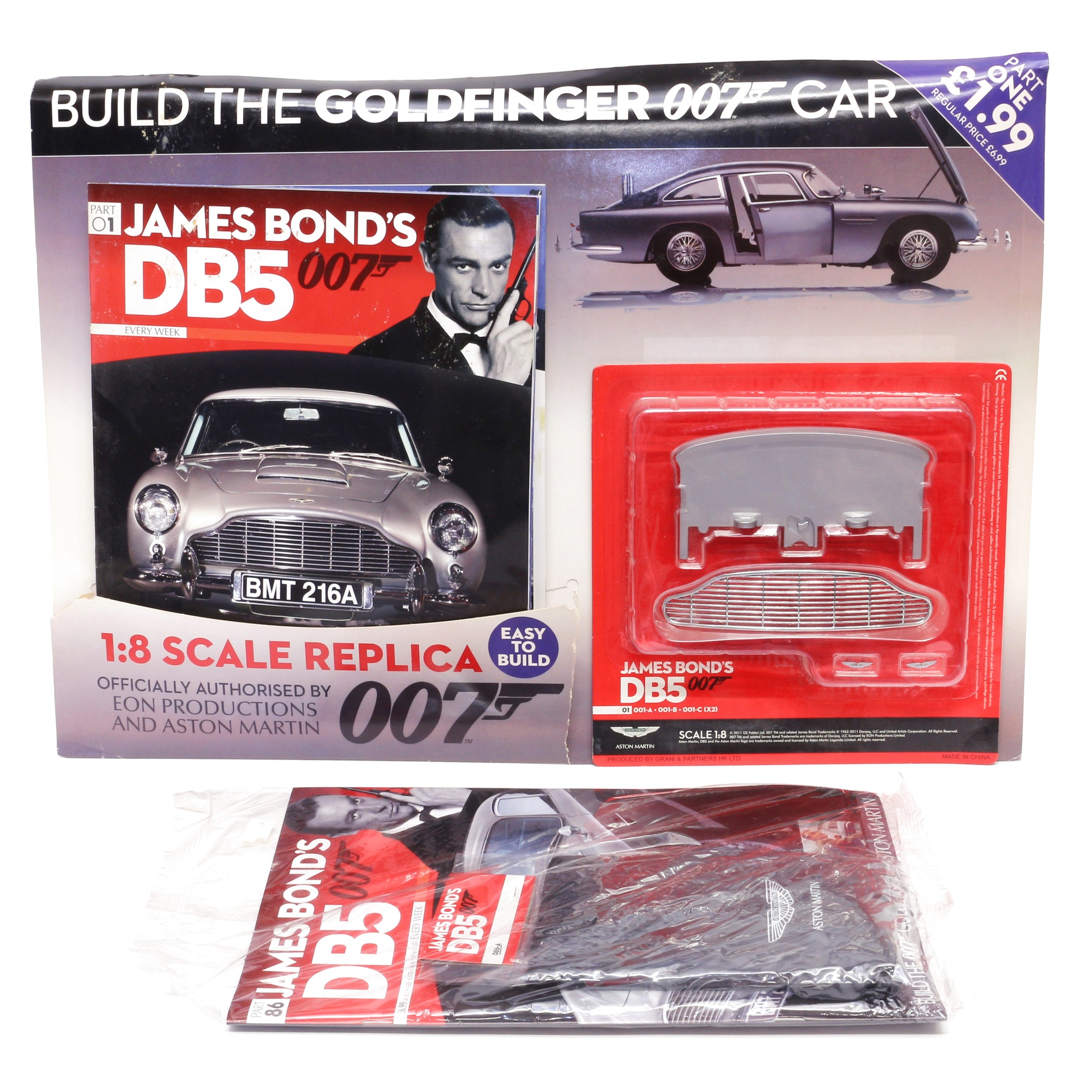 Eaglemoss Publications James Bond 007 1:8 scale diecast Goldfinger Aston Martin DB5 construction set, the unbuilt model comprising a run of weekly magazines and parts, from a straight run of No.1 to No.86 (quantity)