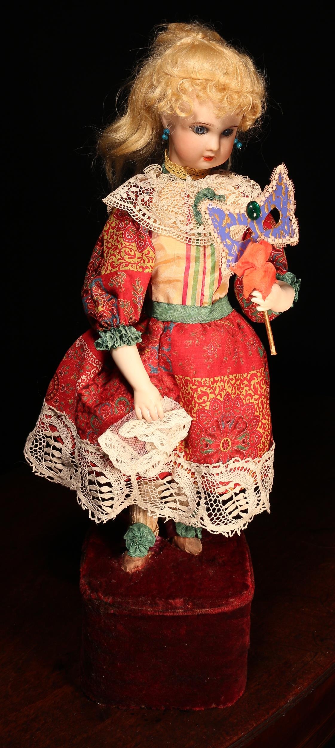 Automata - a late 19th century bisque head musical automaton doll, attributed to Leopold Lambert or similar, the bisque head doll with inset fixed blue glass eyes, painted features including brown feathered eyebrows, fine eyelashes and red lips, open mouth revealing upper teeth, pierced ears, blonde wig on cork pate, impressed marks '21, R, S.F.B.J, PARIS, 3', 38cm high, she stands upon a red velvet rounded rectangular base with fixed key and stop/start lever, remnants of paper label to underside of base; together with an unassociated glass dome with ebonised base (2)  To view a video of this lot please visit https://youtube.com/shorts/bKujVRC1Sgk