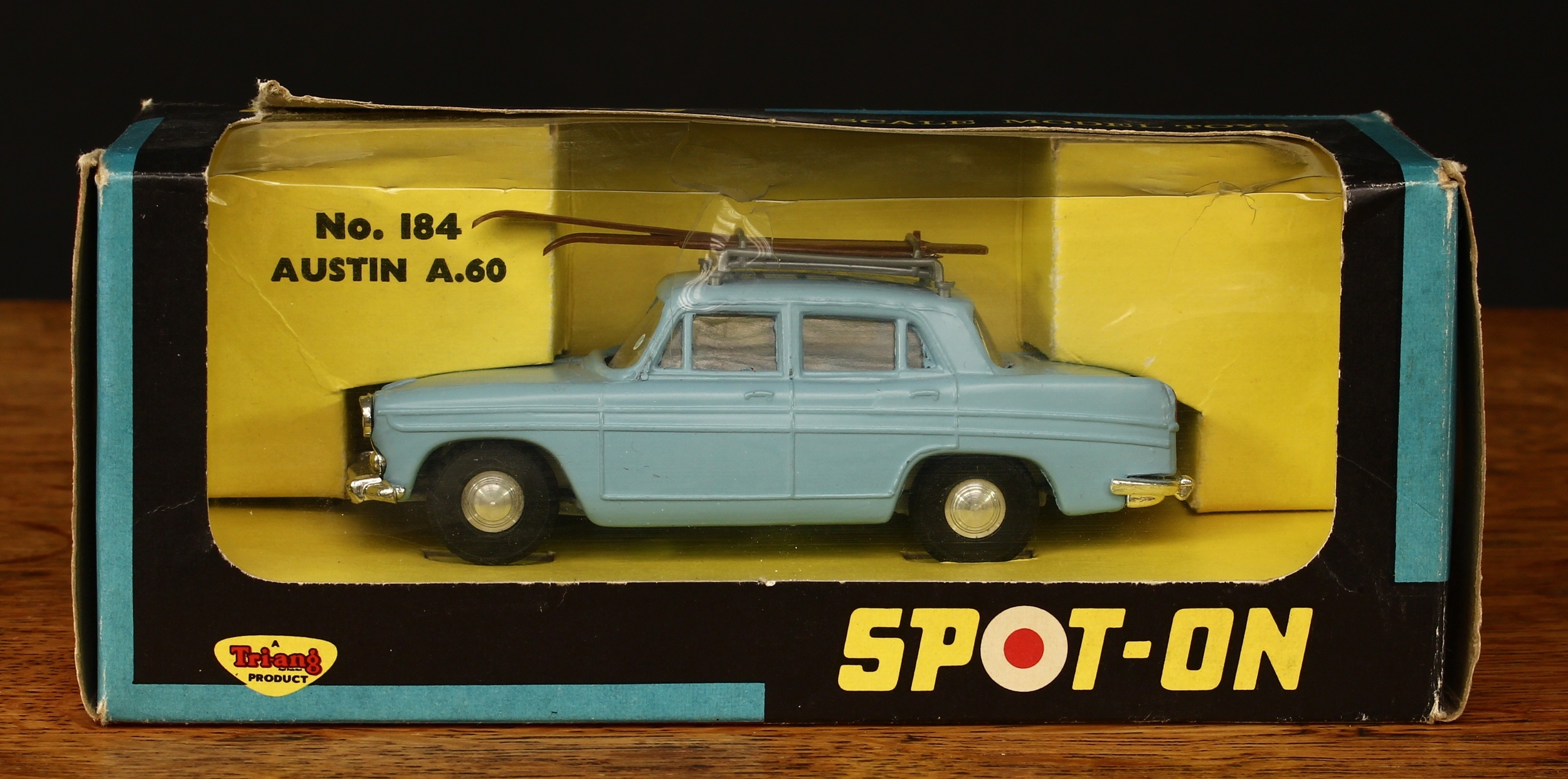 Tri-ang Spot-On 184 Austin A60 Cambridge, pale blue body, white interior, silver roof rack with skis, spun hubs, window boxed with original inner cardboard display piece