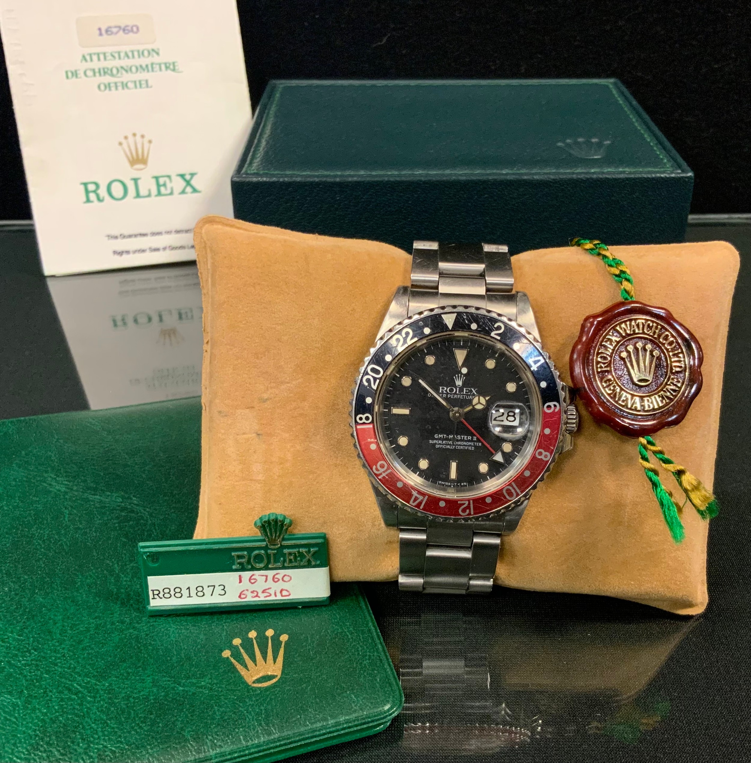 A Rolex Oyster Perpetual GMT-Master II ' Coke' stainless steel gentleman's wristwatch, ref. 16760, serial no. 881873, rotating two tone red and black bezel, black dial with luminous dot and block markers, sweep centre seconds and date aperture, minute track, on Oyster 78360 bracelet, original 62510H spare bracelet and 78360 strap link,  42mm wide, boxed with original paperwork, purchased 17/1/1989 by the vendor, recently serviced