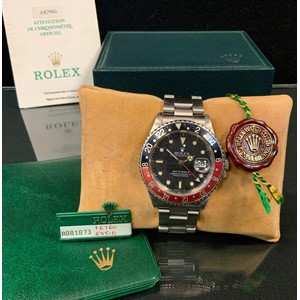 A Rolex Oyster Perpetual GMT-Master II ' Coke' stainless steel gentleman's wristwatch, ref. 16760, serial no. 881873, rotating two tone red and black bezel, black dial with luminous dot and block markers, sweep centre seconds and date aperture, minute track, on Oyster 78360 bracelet, original 62510H spare bracelet and 78360 strap link,  42mm wide, boxed with original paperwork, purchased 17/1/1989 by the vendor, recently serviced