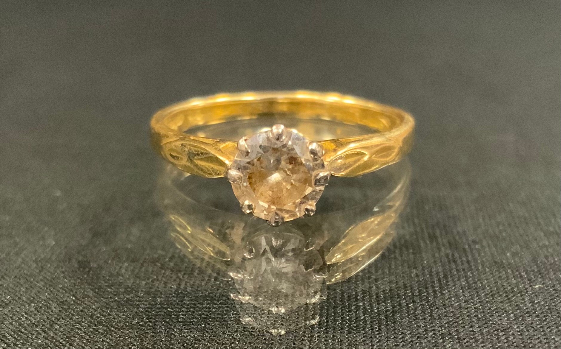 A diamond solitaire ring, round brilliant cut diamond approx 1.0ct, 18ct gold shank, size O, 3.2g gross