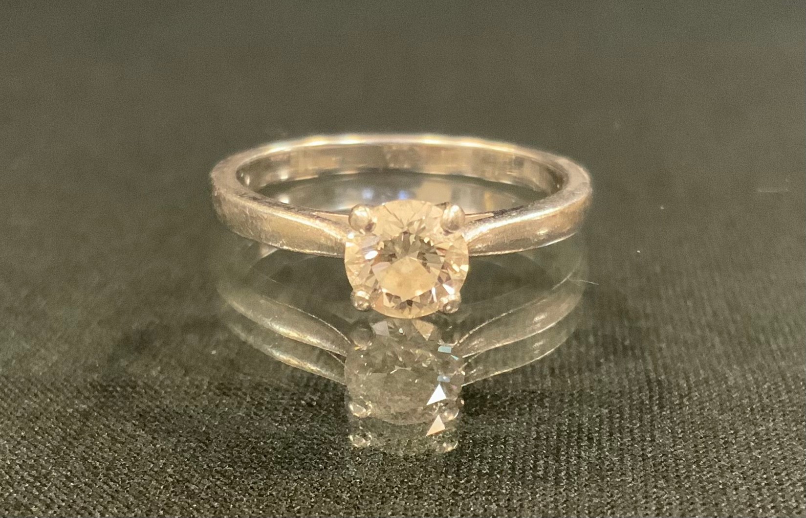 A platinum diamond solitaire ring, the brilliant cut stone approx. 0.61 carat, ring size L, 3.59g, with GIA certificate, VS2