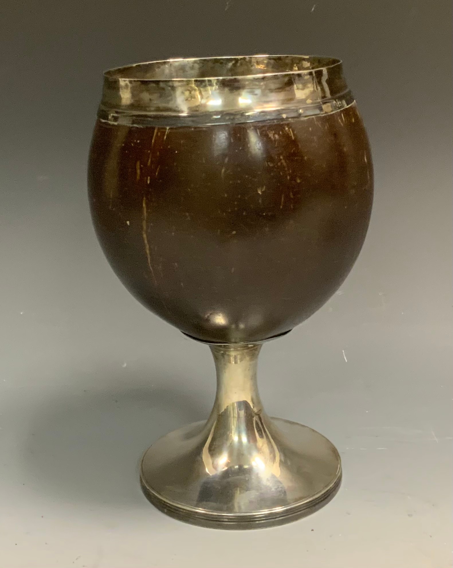 A George III silver mounted coconut cup, flared circular foot, 18.5cm high,   Thomas Phipps & Edward Robinson, London 1799
