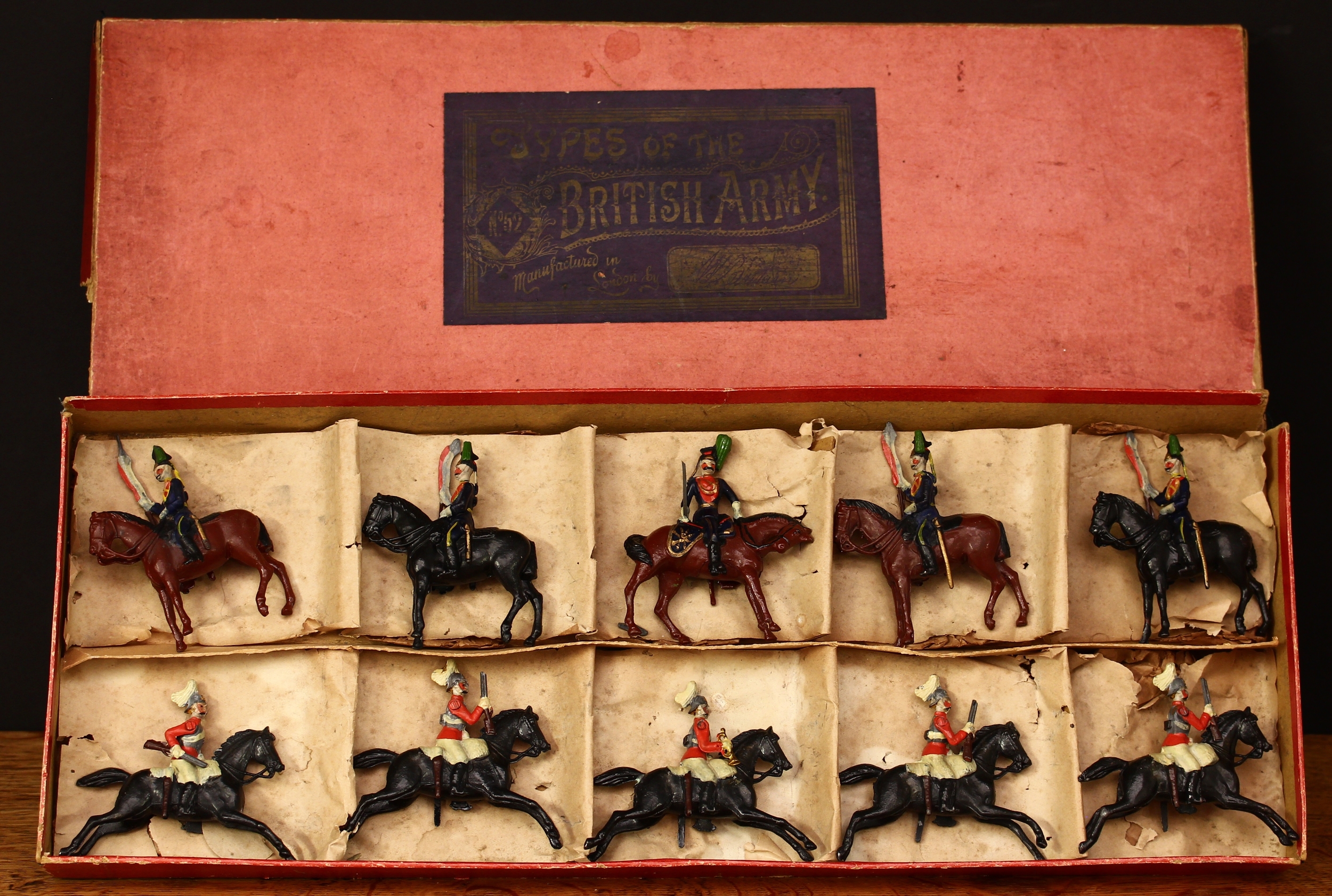 W Britain (Britains) Types of the British Army set No.52, comprising 5th Irish Lancers (twisted rear leg version) and 2nd Life Guards (rocking horse version), boxed with original inner compartments, paper dividers and brown paper packaging - black rectangular label to box lid