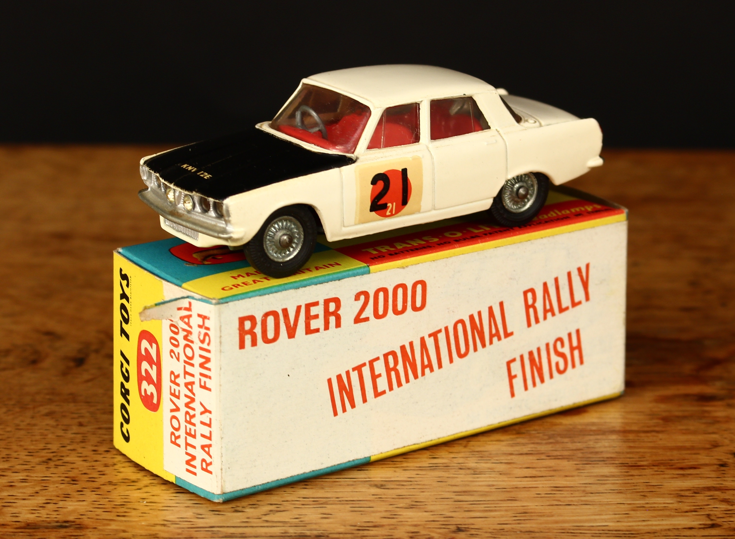 Corgi Toys 322 Rover 2000 in International Rally finish, white body with black bonnet and racing number '21' decals to side doors, 'trans-o-lite' headlamps with jewelled spot lamps, boxed - red and white over label to box