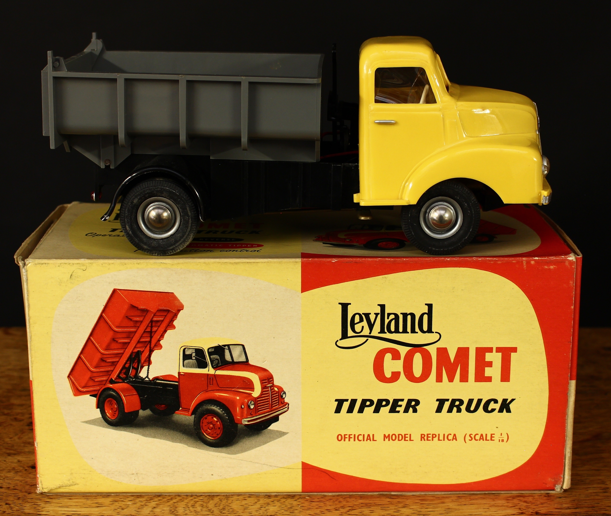Victory Industries (V Models) 1:18 scale Leyland Comet tipper truck, detachable yellow plastic cab, black plastic chassis and rear wheel arches, grey plastic tipper truck, 24cm long, boxed with original inner cardboard packaging piece