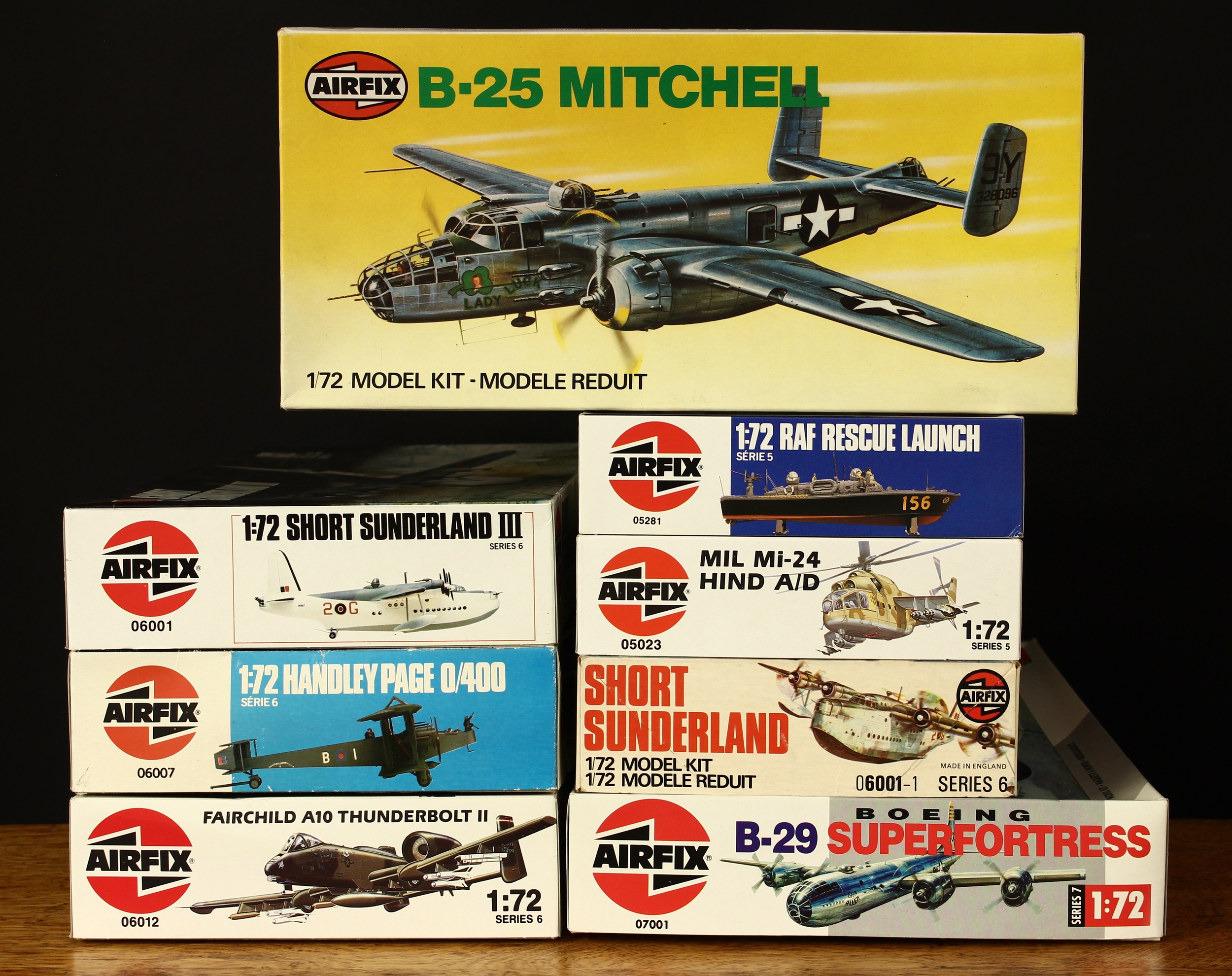 A collection of 1:72 scale Airfix model kits, comprising Airfix 06001 Series 6 Short Sunderland III model kit, boxed with instructions; Airfix 06007 Series 6 Handley Page 0/400 model kit, boxed with instructions; Airfix 9 04005 Series 4 B-25 Mitchell model kit, boxed with instructions; Airfix 06012 Series 6 Fairchild A10 Thunderbolt II model kit, boxed with instructions; Airfix 05281 Series 5 RAF Rescue Launch model kit, boxed with instructions; Airfix 05023 Series 5 MIL Mi-24 Hind A/D model kit, boxed with instructions; Airfix 06001-1 Series 6 Short Sunderland III model kit, boxed with instructions and an Airfix 07001 Series 7 Boeing B-29 Superfortress model kit, boxed with instructions (8)