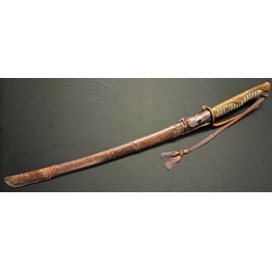 WW2 Imperial Japanese Army Officers Kyu Gunto Sword with single edged fullered blade 605mm in length. Tang is signed to both sides. Two holes to tang. Wire bound shark skin grip. Bronze decorative mounts. Company grade Officers knot. Scabbard has active service leather cover in place. Plus a green cotton cover. New to the market, war souvenir of a British Serviceman.