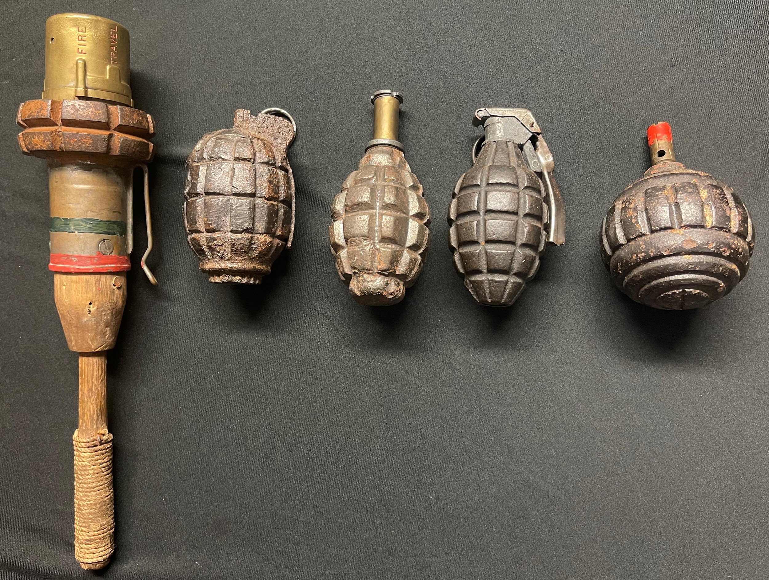 WW1 Grenade collection comprising of British Grenade, Hand, No.1: WW1 British No5 MKI Mills Grenade: WW1 German Kugel Grenade: WW1 US Mk I Grenade: WW1 French F1 Grenade. NOTE: ALL INERT & FFE. (5)