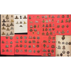 A collection of approx. 120 British Cap badges to include: Royal Artillery, Queen Own Yeomanry, Iniskillings, Kings Own Lancasters, Carabiners, King Dragoon Guards, Queens Lancashers, East Yorks, West Yorks, Royal Scots Dragoon Guards, 17th / 21st Lancers, 7th Dragoon Guards, XXVI Hussars, 13th Hussars, Middlesex Regt, Norfolk Regt, York & Lancs, Manchester Regt, DLI, North Staffs, East Lancs, Royal Sussex Regt, South Staffs, Suffolks, The Buffs, etc.