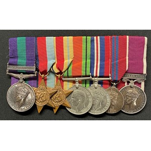 WW2 British Coldstream Guards Guards Prisoner of War Medal group to 5932020 Clp. G Keen, Coldstream Guards comprising of GR VI General Service Medal with Palestine Clasp, 1939-45 Star, Africa Star, Defence Medal, War Medal, ERII Coronation Medal, Long Service and Good Conduct Medal. All court mounted on a bar with original ribbons. Plus his German PoW Dog Tag from Stalag IVB with original neck cord.