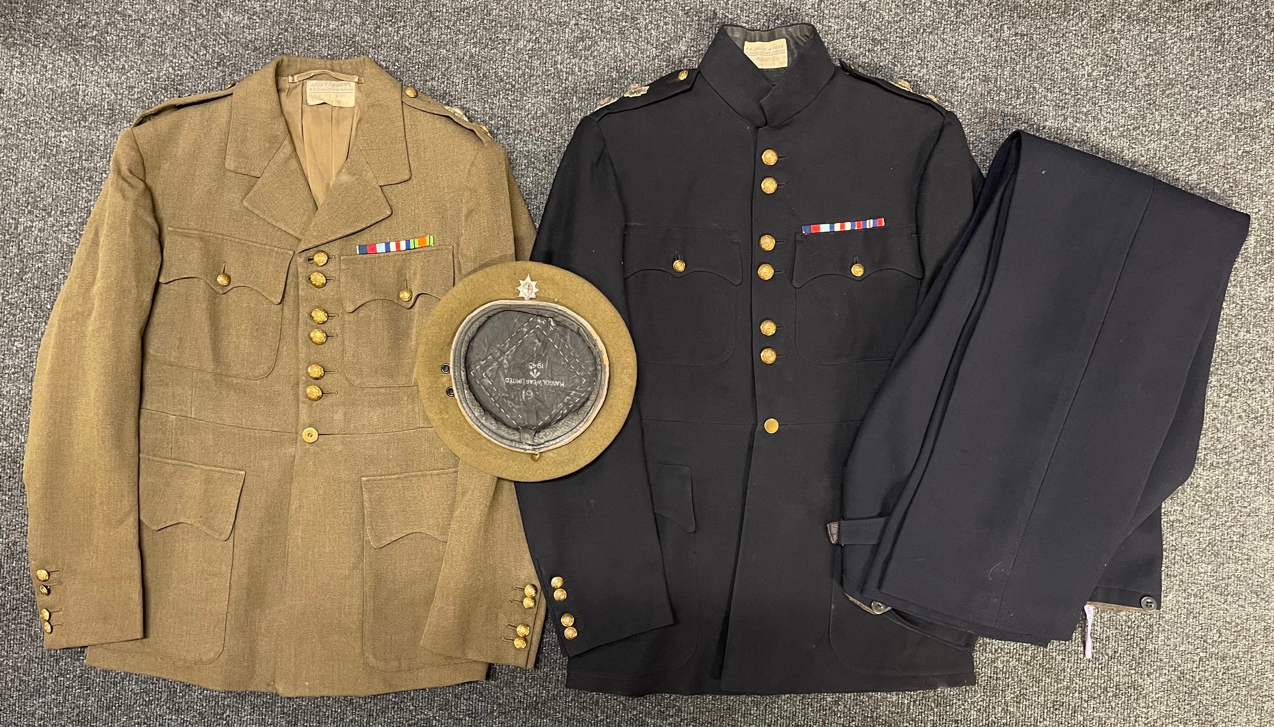 WW2 British Coldstream Guards Named Officers Uniform Group. 1942 Pattern Officers Service Dress Tunic by "Lesley & Roberts, 16 St George St. Hanover Square, London" dated 2/43 and named to "G Hohler Esq." Rank for Lt. Coldstream Guards pattern rank pips and buttons. Complete with ribbon bar with 1939-45 Star, France & Germany Star and Defence Medal. No belt. Small size approx. 30 chest. Plus Khaki Beret size 6 3/4 by "Kangol Wear Limited" dated 1945 with enamelled Coldstream Guards Officers badge. Along with his Dress Blue's Uniform with Coldstream Guards buttons and wire bullion hand embroidered rank pips for a Lt. Tailors label to jacket for "CF Johns & Pegg, 2 Clifford Street, London W" named and dated to "G. Hohler, May 1943". Plus unmarked matching dress blue trousers. (4)