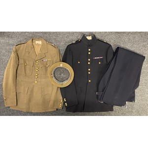 WW2 British Coldstream Guards Named Officers Uniform Group. 1942 Pattern Officers Service Dress Tunic by "Lesley & Roberts, 16 St George St. Hanover Square, London" dated 2/43 and named to "G Hohler Esq." Rank for Lt. Coldstream Guards pattern rank pips and buttons. Complete with ribbon bar with 1939-45 Star, France & Germany Star and Defence Medal. No belt. Small size approx. 30 chest. Plus Khaki Beret size 6 3/4 by "Kangol Wear Limited" dated 1945 with enamelled Coldstream Guards Officers badge. Along with his Dress Blue's Uniform with Coldstream Guards buttons and wire bullion hand embroidered rank pips for a Lt. Tailors label to jacket for "CF Johns & Pegg, 2 Clifford Street, London W" named and dated to "G. Hohler, May 1943". Plus unmarked matching dress blue trousers. (4)