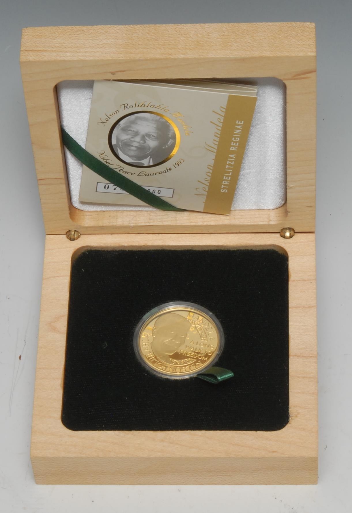 Nelson Mandela - Coins and Medals - Mandela's Gold Strelitzia Reginae, Mint of Norway 24ct gold commemorative medallion, a long walk to freedom, 14.17g, limited edition 783/1000, issued 2012, boxed.