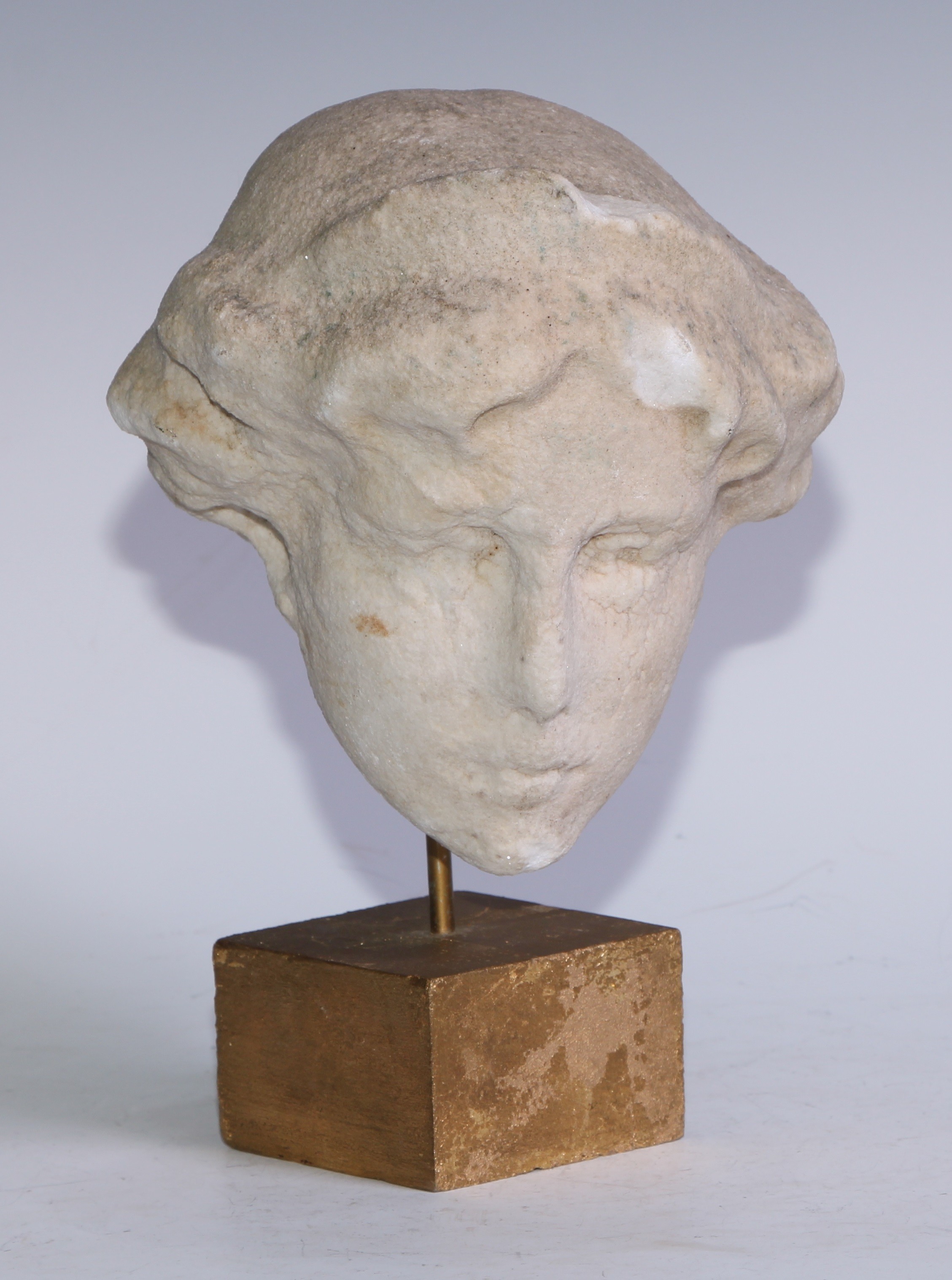 A Baroque white marble sculptural fragment, the head of Diana, 15cm high, c.17th/18th century, mounted for display, 21cm high overall