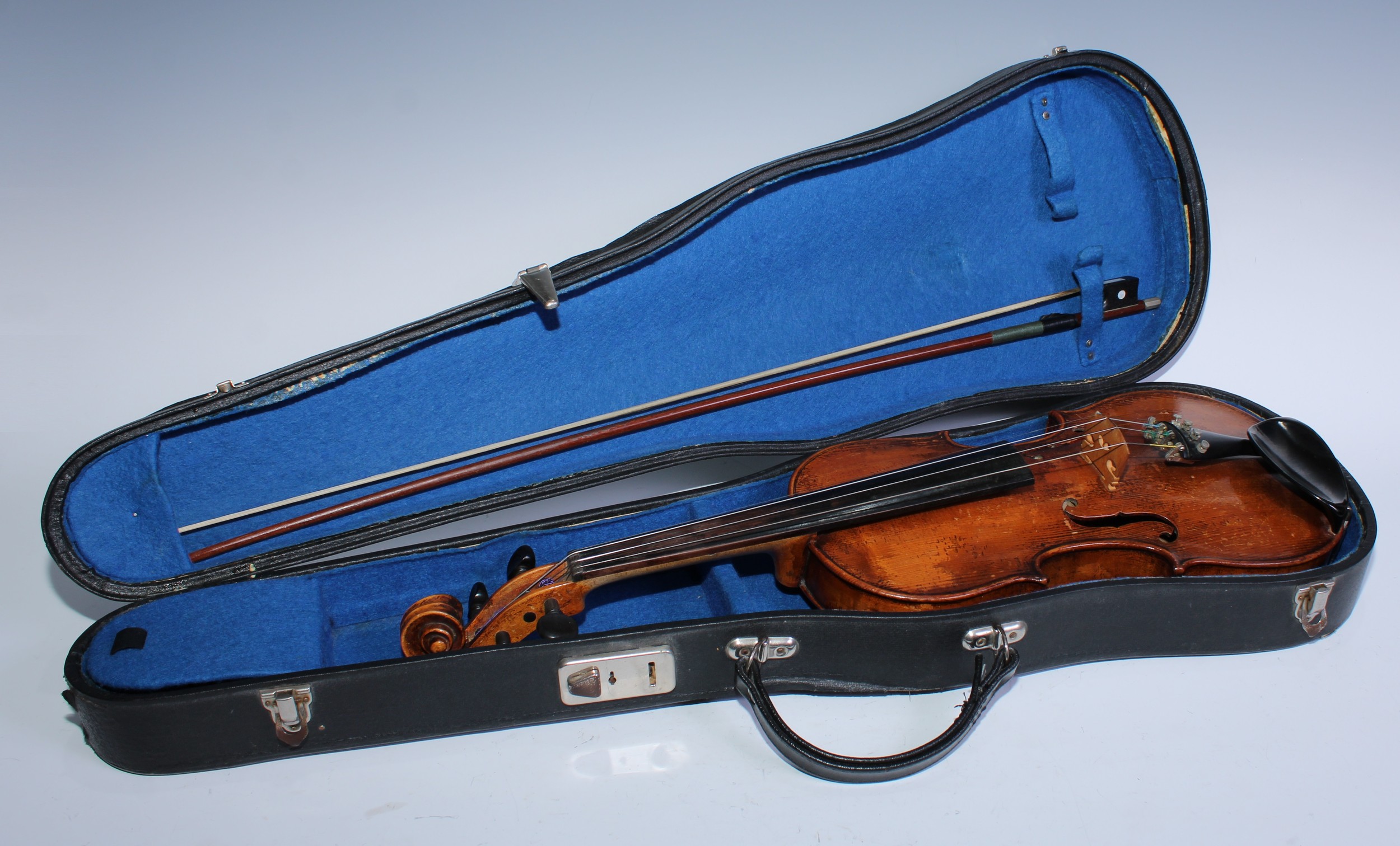 A violin, the one piece back 36cm long excluding button, paper label printed Carlo Bergonzi fece in Cremona and dated in ink 17[88], outlined throughout with purfling, ebony tuning pegs, 60cm long overall, cased, the bow 74cm long