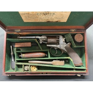 Cased Beaumont Adams Double Action 54 Bore Percussion Cap Revolver serial number B15381. Adams Patent No.31045R. 140mm long barrel. Top strap engraved "William & Powell, 25 South Castle St. Liverpool". Working order. Good original finish.  Overall length 299mm. London Proof marked. Complete is original wooden case with label, along with bullet mould, Hawksley powder flask, tin of caps, brush, oil bottle etc. Section 58 (2) no licence required.