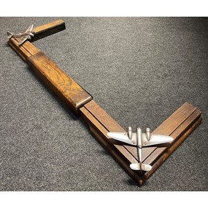 WW2 British RAF Sgt's or Officers Mess Fireplace Surround. The surround is adjustable to fit different size fireplaces from 88.5cm to 112.5 cm internal dimensions. Internal depth 27.5cm. At each corner is fitted a chrome plated model of a Blenheim Bomber, size 22cm wingspan. No makers markings.