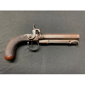 Percussion cap pistol with 115mm long barrel. Bore approx. 14mm. Proof marked. Barrel signed "Parkes, London". Working action which holds at both full and half cocked positions. Folding integral ramrod. Chequered wooden butt with inset blank silver escutcheon plate.  Overall length 225mm. Section 58 (2) no licence required.
