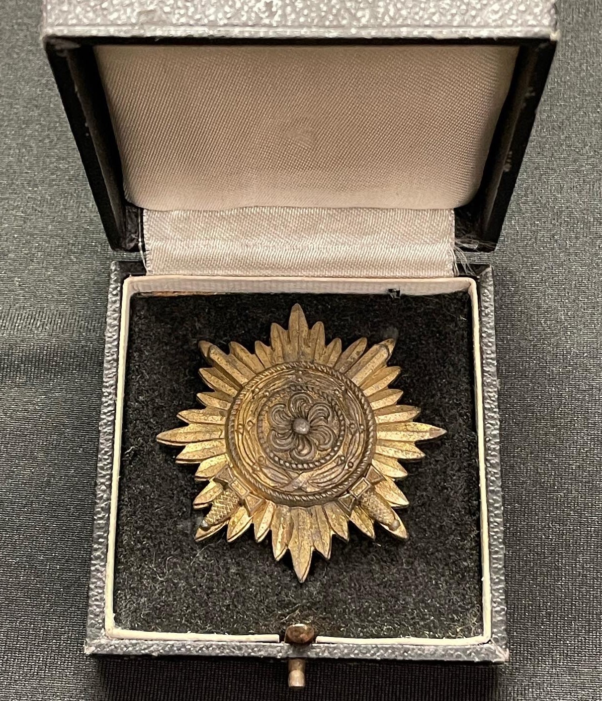 WW2 Third Reich Ostvolkmedaille 1er Klasse in Gold mit Schwertern - Eastern Peoples Medal 1st Class in Gold with Swords. No makers mark. Complete in original award case. War souvenir of a British Veteran, Trooper RL Clay, Royal Armoured Corps, new to the market.