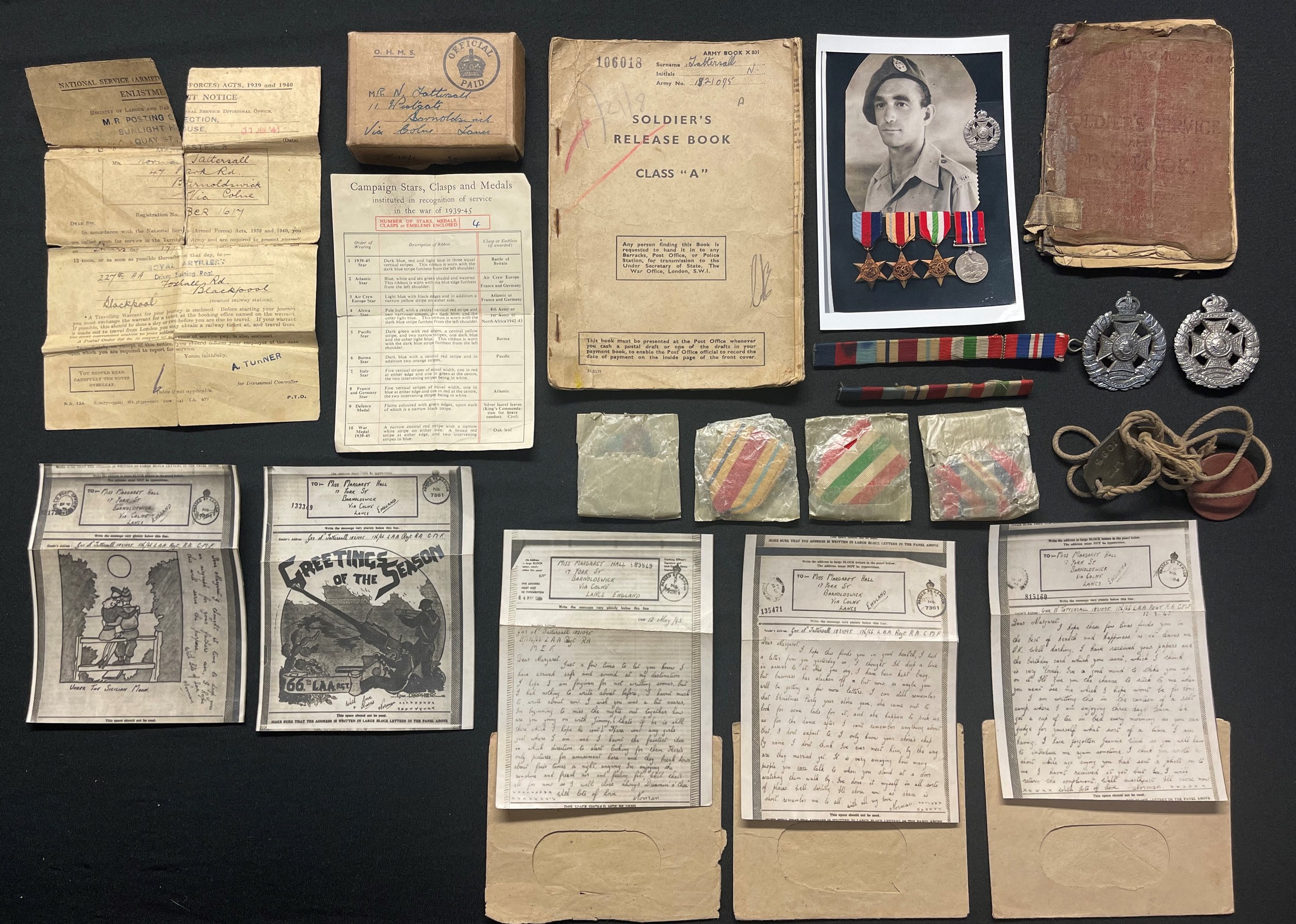 WW2 British Desert Rat's Medal group to 1821095 Rifleman Norman Tattersall, Rifle Brigade, comprising of :  1939-45 Star, Africa Star, Italy Star and War Medal, all in original packets with ribbons, boxed with award slip, along with two medal ribbons plus two Rifle Brigade cap badges, Identity Discs, AB64 Paybook, Soldiers Class A Release book, Airgraph letters home etc.