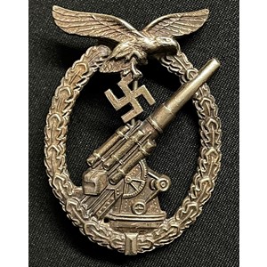 WW2 Third Reich Kriegsabzeichen fur die Marine-Artillerie. Coastal Artillery War Badge. No makers mark, but is a Steinhauer & Luck made example in zink.