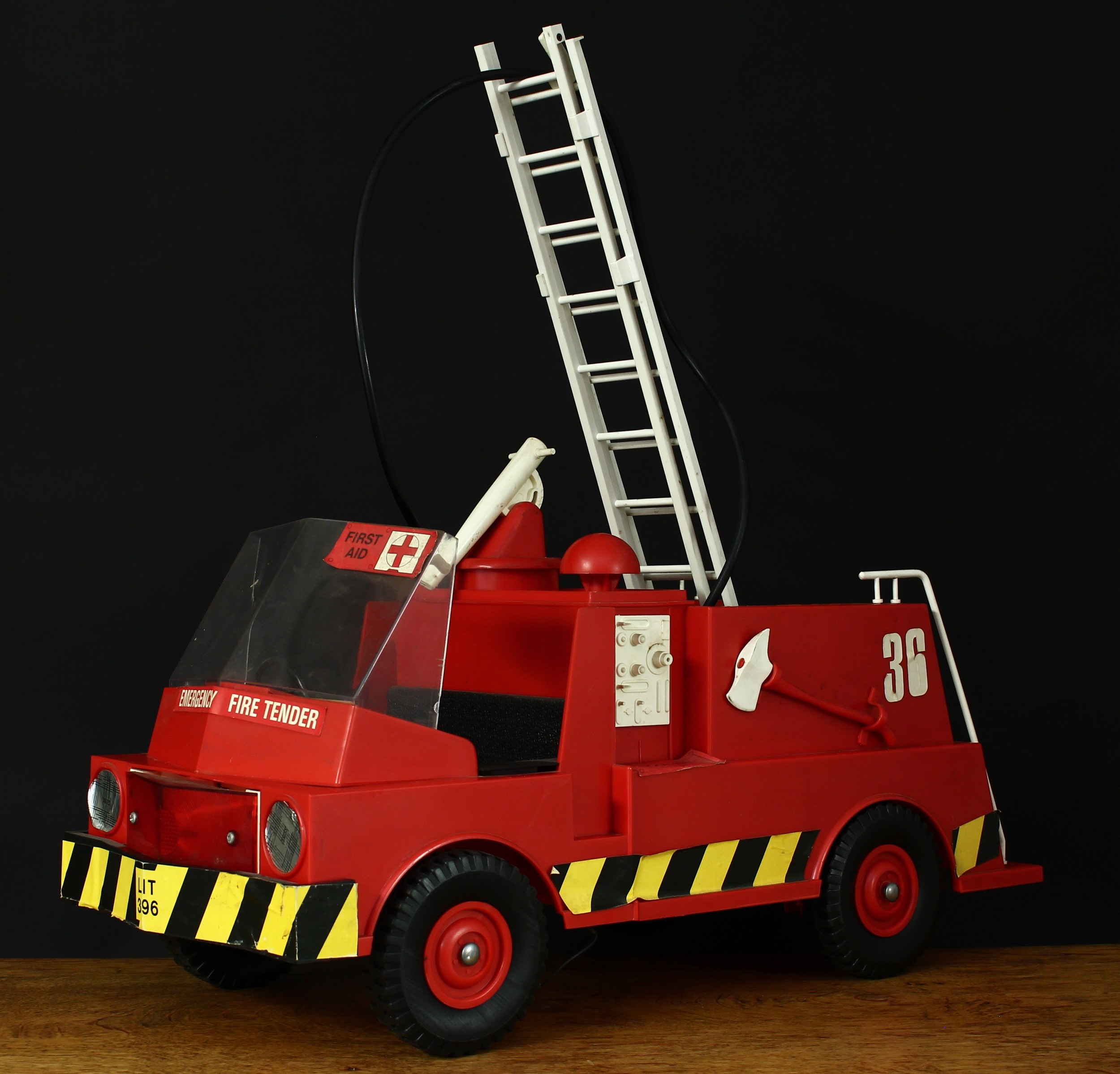 A Palitoy Action Man emergency fire tender, red body with various decals, 57cm long, unboxed