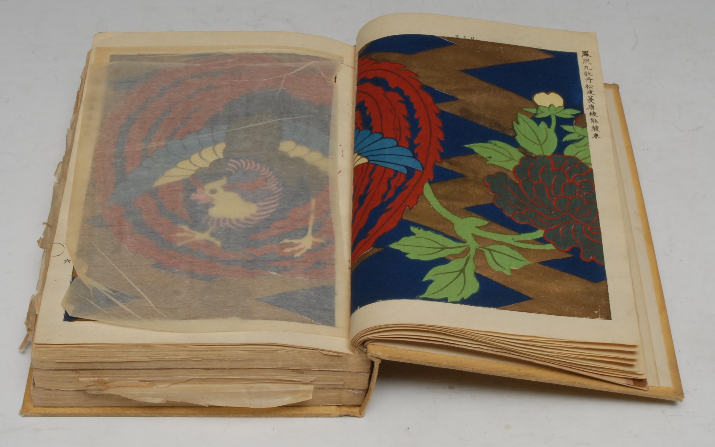 Japan - Japanese Motifs Etc., two parts bound as one, [Meiji period], compiled and illustrated with decorative motifs and designs woodblock-printed, hand-coloured in polychrome, and some picked-out in gilt, depicting faun, flora, and stylized motifs, black-ruled borders, the two parts transposed and numbered: 508-690 & 407-507, prefixed by prelims, early 20th century English cloth enclosing the original wrappers, gilt-lettered back, large 8vo, [1]