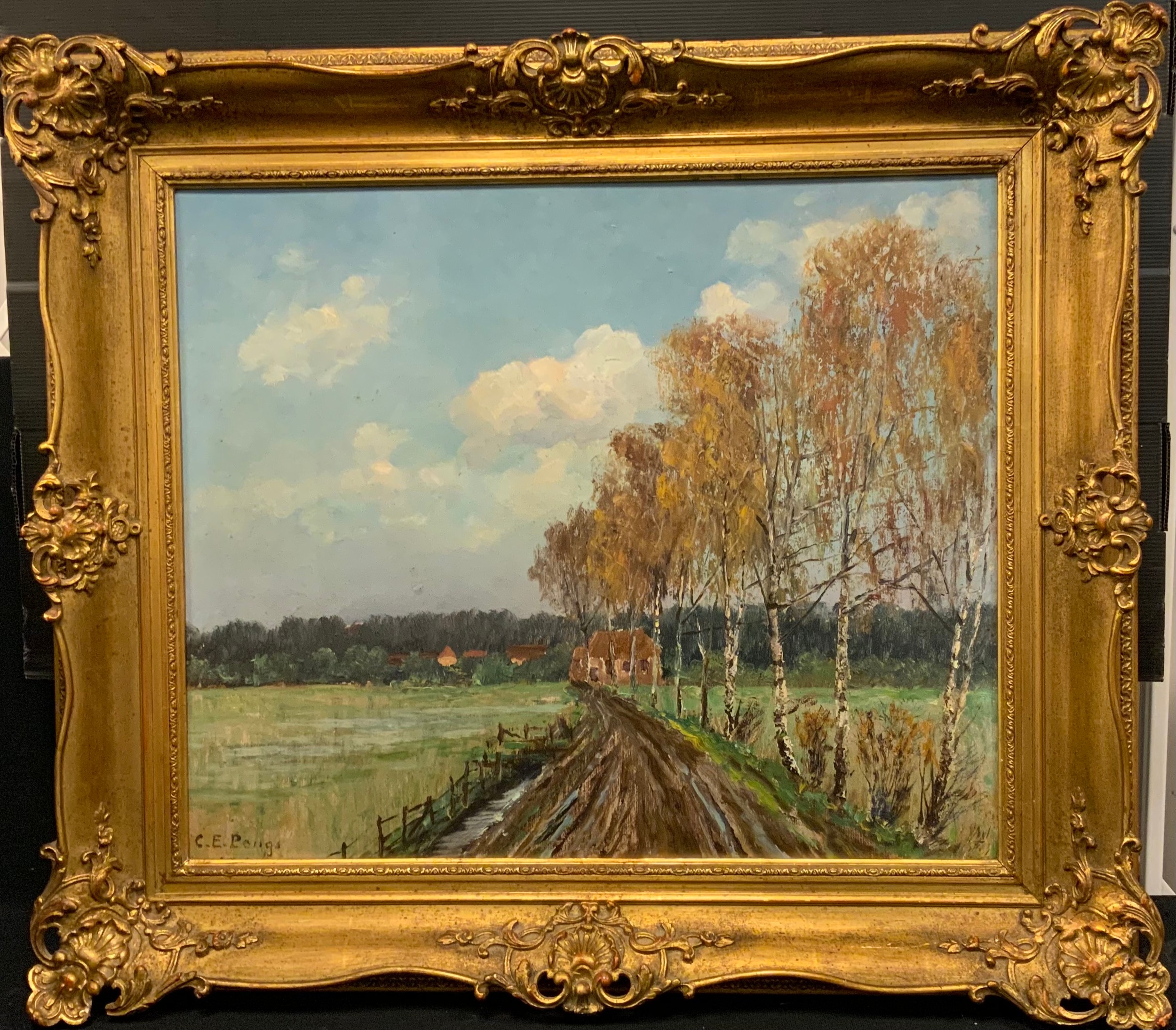 C E Pone** (French, late 19th/early 20th century), Farm track with autumn birch trees, signed, oil on canvas, 50cm x 60cm, ornate gilt frame