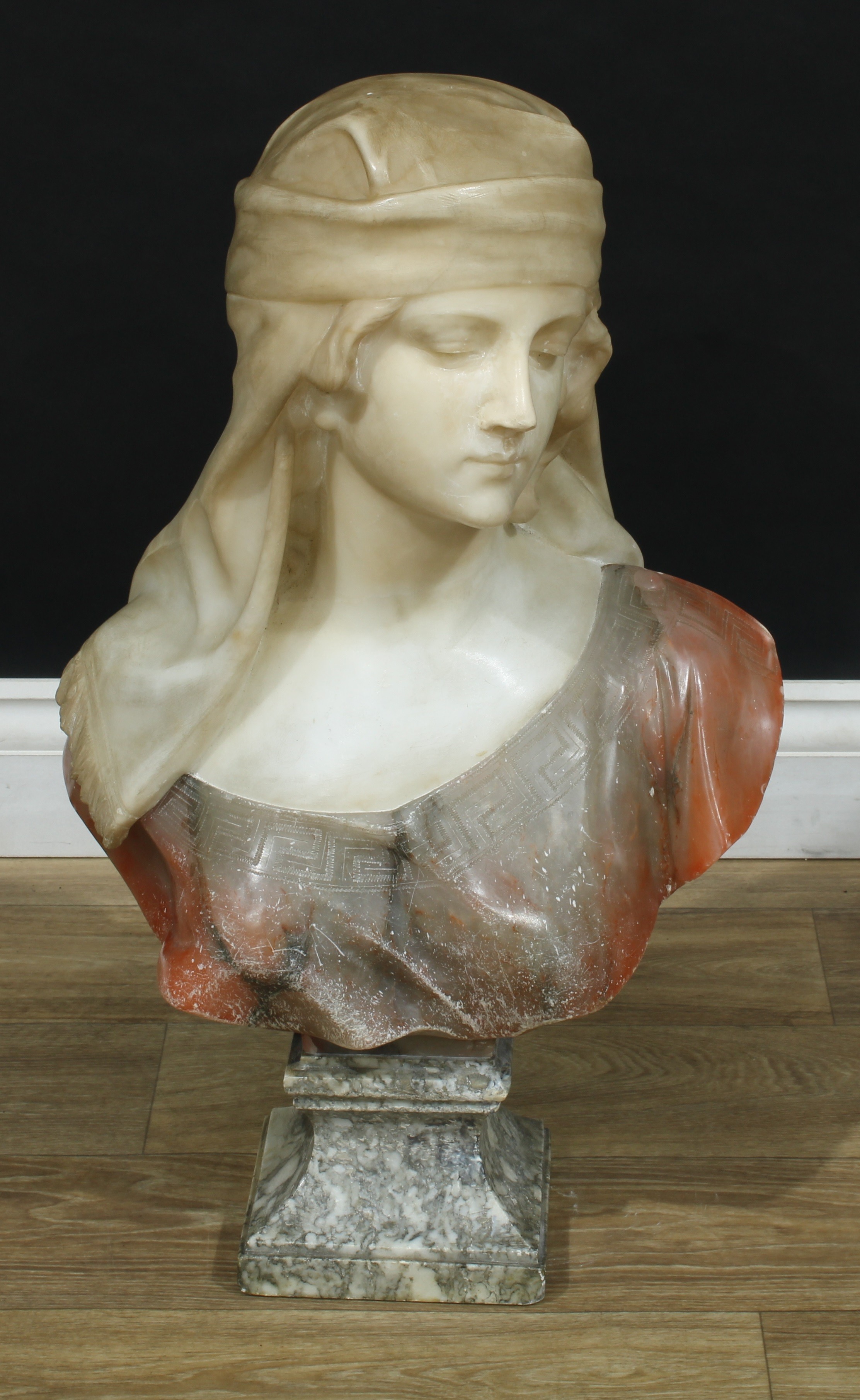 Continental School (19th century), an alabaster bust, of an Etruscan beauty, waisted square marble socle, 64cm high