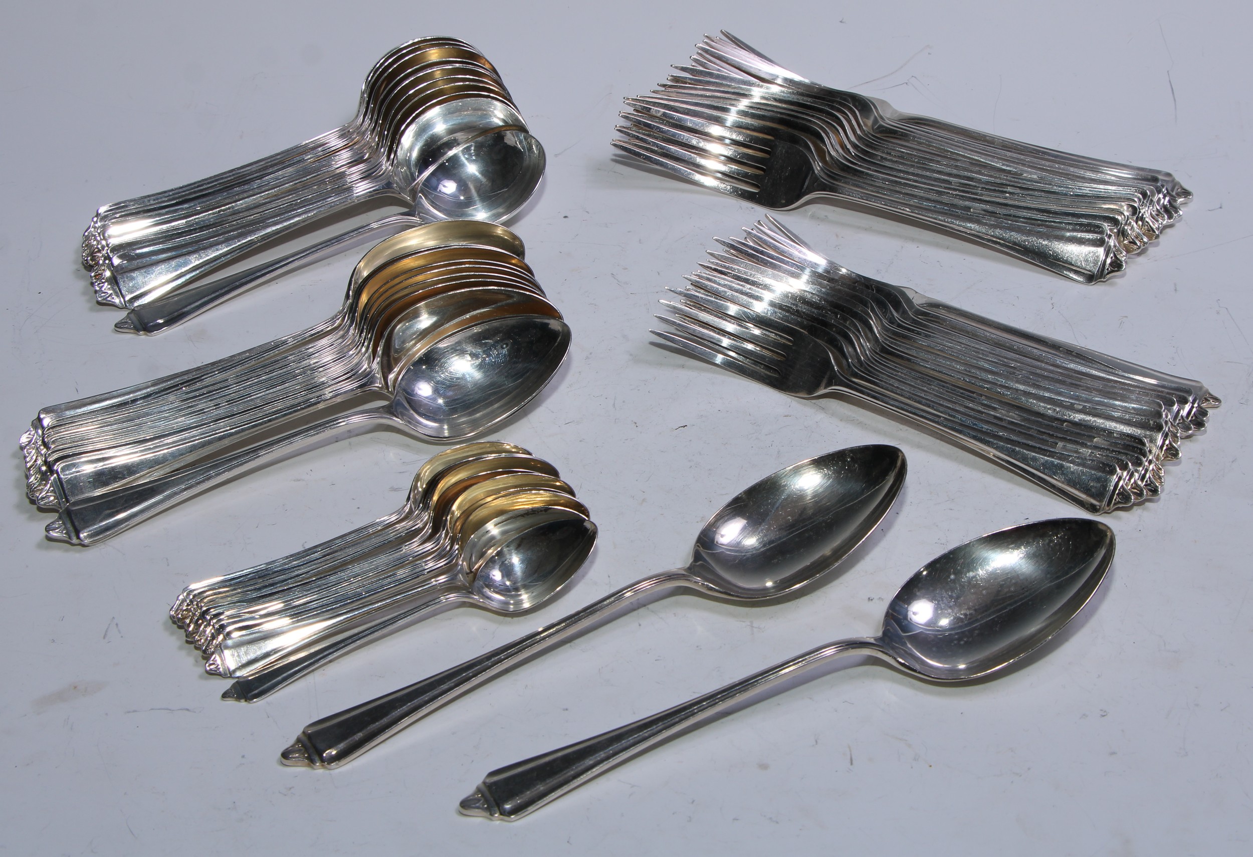 A service of silver Belmont pattern  flatware, for twelve, comprising dessert forks and spoons, soup spoons, table forks,  teaspoons and two table spoons,  Sheffield 1973, 2795g (90ozt)