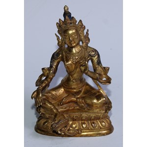 A 19th century gilt bronze Tara Buddha, typically seated with her right foot resting on a lotus flower, seated on a double lotus throne with her right leg stretched forward in lalitasana, painted blue hair, 16.5cm high