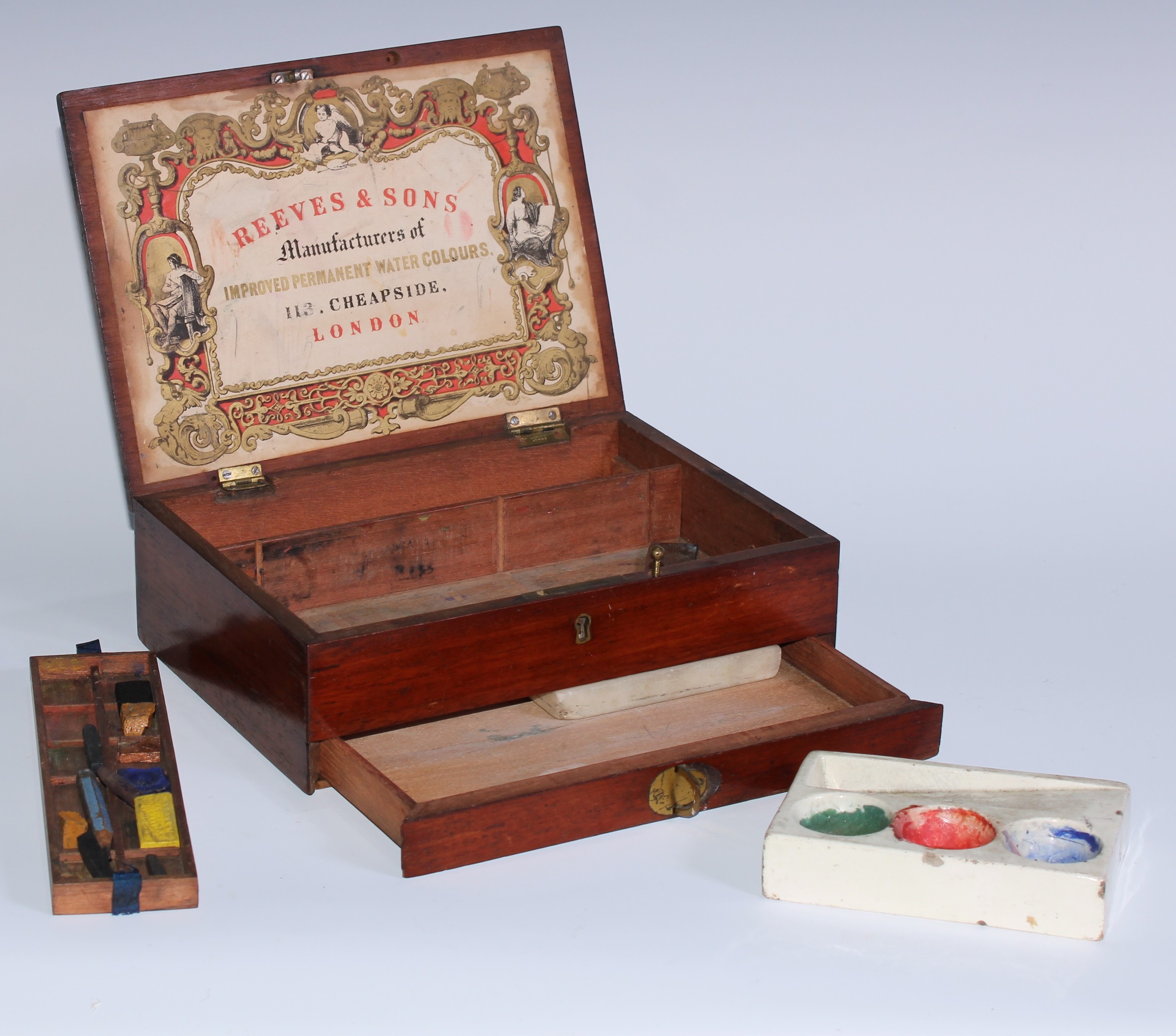 An early Victorian mahogany rectangular artists box, by Reeves & Sons, 113 Cheapside, London,  hinged cover enclosing provision for paint and requisites, drawer to base with flush brass campaign type handle, 23cm wide, c.1840