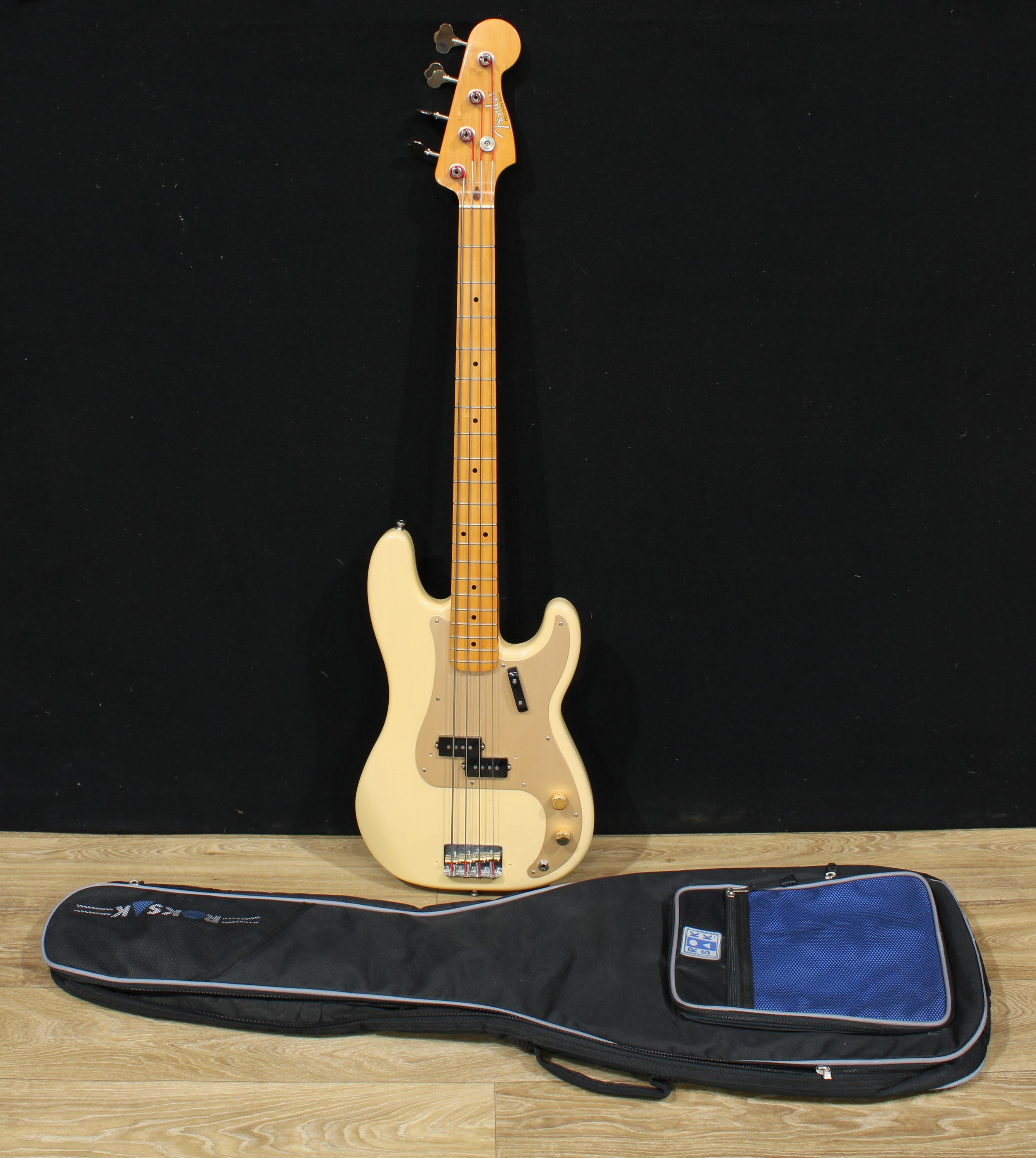 A Fender Precision bass guitar, made in Mexico, numbered MZ4192079, café au lait finish, 117cm long, cased