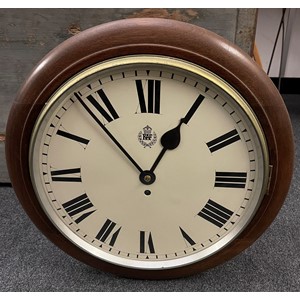 WW2 British RAF Wall Clock with 35cm enamel dial with Roman Numerals and RAF Crest. The wooden case is Air Ministry marked along with the maker name of FW Elliot Ltd. Fusee Movement is also maker marked to FW Elliot along with serial number 17110 and dated 1941. Complete with pendulum and key.