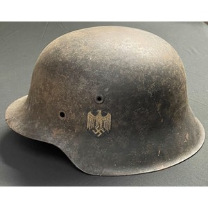 WW2 Third Reich Heer Single Decal M42 Helmet shell. Original paintwork and decal. Slight battle damage to front edge of the helmet. No linerband, liner or chinstrap. Shell is maker marked "ckl" and size marked "66".
