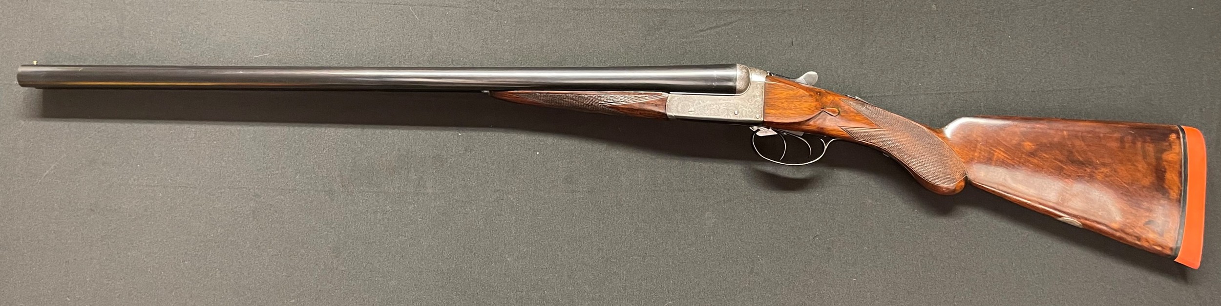 T Wild of Birmingham 12 Bore Side by Side Shotgun with 635mm long barrels, serial number 21380. 2 1/2 inch Choke. Overall length 115cm. NOTE: Buyer must hold a valid Shotgun Certificate or be a Registered Firearms Dealer.