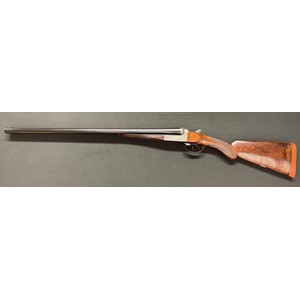 T Wild of Birmingham 12 Bore Side by Side Shotgun with 635mm long barrels, serial number 21380. 2 1/2 inch Choke. Overall length 115cm. NOTE: Buyer must hold a valid Shotgun Certificate or be a Registered Firearms Dealer.