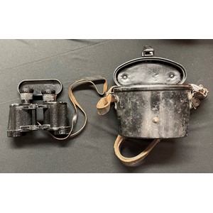 WW2 Third Reich 6 x 30 Dienstglass Binoculars. H/6400. Serial number 3384. Maker code marked "gkp" KF. Complete with original leather neck strap, bakelite lens cover, bakelite carrying case and leather strap. Makers code markings inside the case.