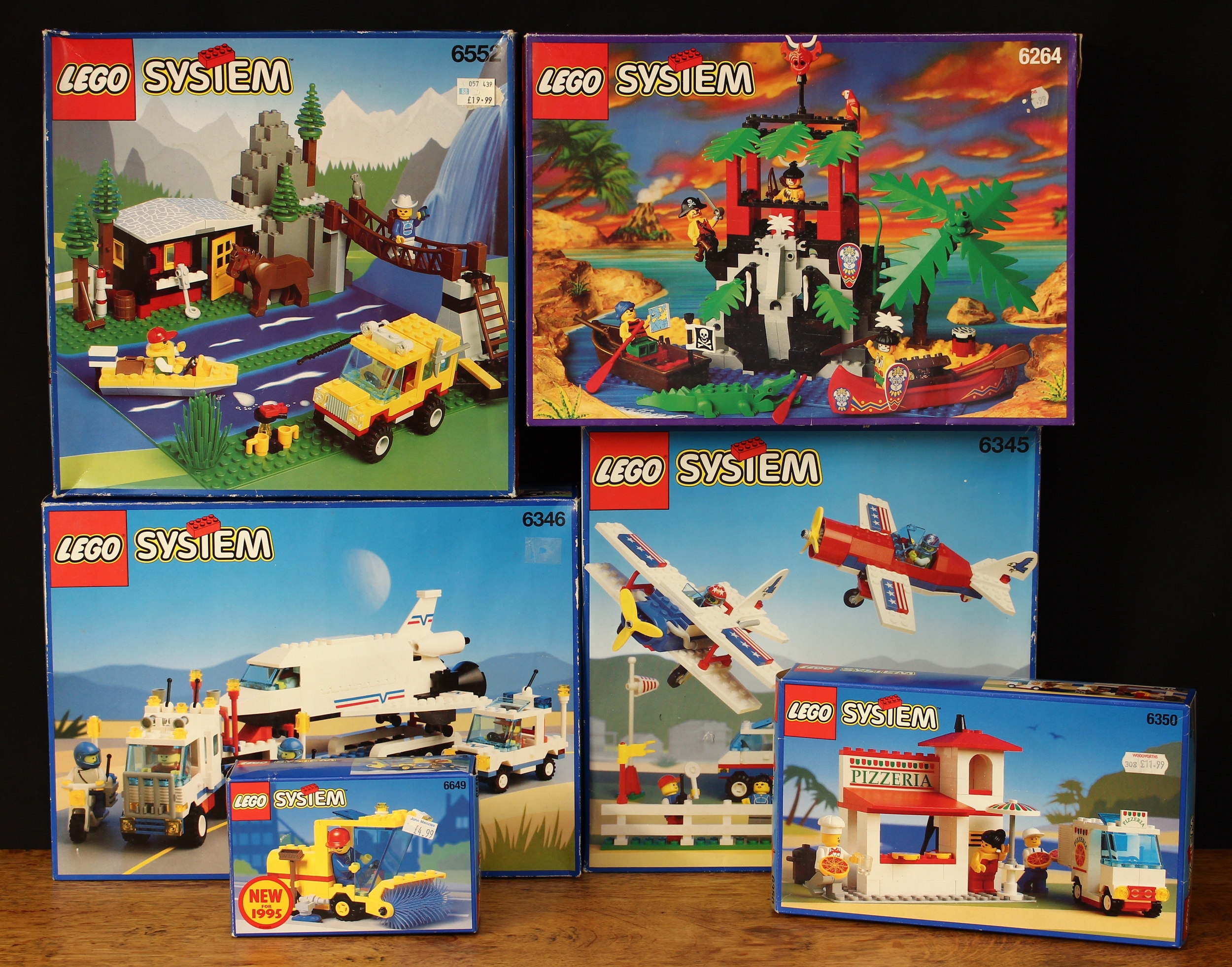 Lego System sets, comprising 6264 Forbidden Cove set, boxed; 6345 Aerial Acrobats Air Show set, boxed; 6346 Shuttle Launching Crew set, boxed; 6350 Pizzeria set, boxed; 6552 Rocky River Retreat set, boxed and 6649 Road Sweeper set, boxed (6)
