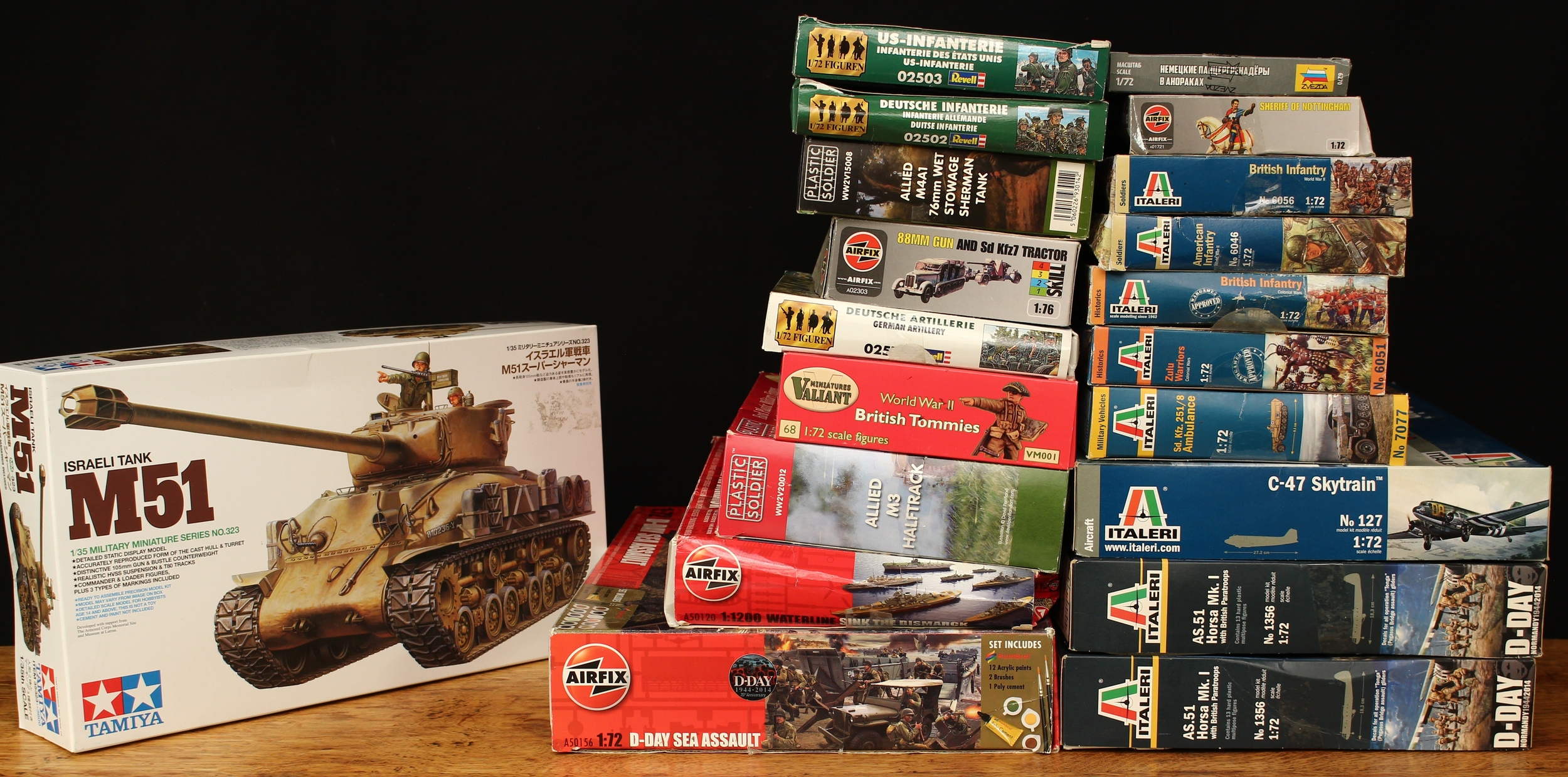 A collection of model kits, comprising Tamiya 1:35 scale Israeli tank M51, item 35323**3600, boxed; Italeri 1:72 scale kits, comprising C-47 Skytrain, No.127, boxed; two AS.51 Horsa Mk.1 with British Paratroops, No.1356, boxed; Zulu Warriors (Colonial wars), No.6051, boxed; Sd.Kfz.251/8 ambulance, No.7077, boxed and British Infantry (Colonial wars), No.6050; other 1:76 and 1:1200 kits from manufacturers such as Airfix, Revell and Valiant Miniatures etc (20)